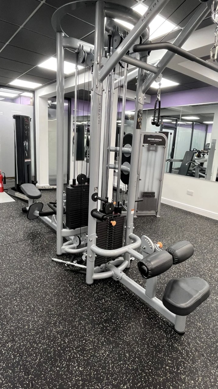 A multi-station cable machine in the strength area